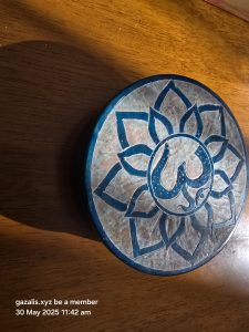 Om Symbol Floral Design on Wood